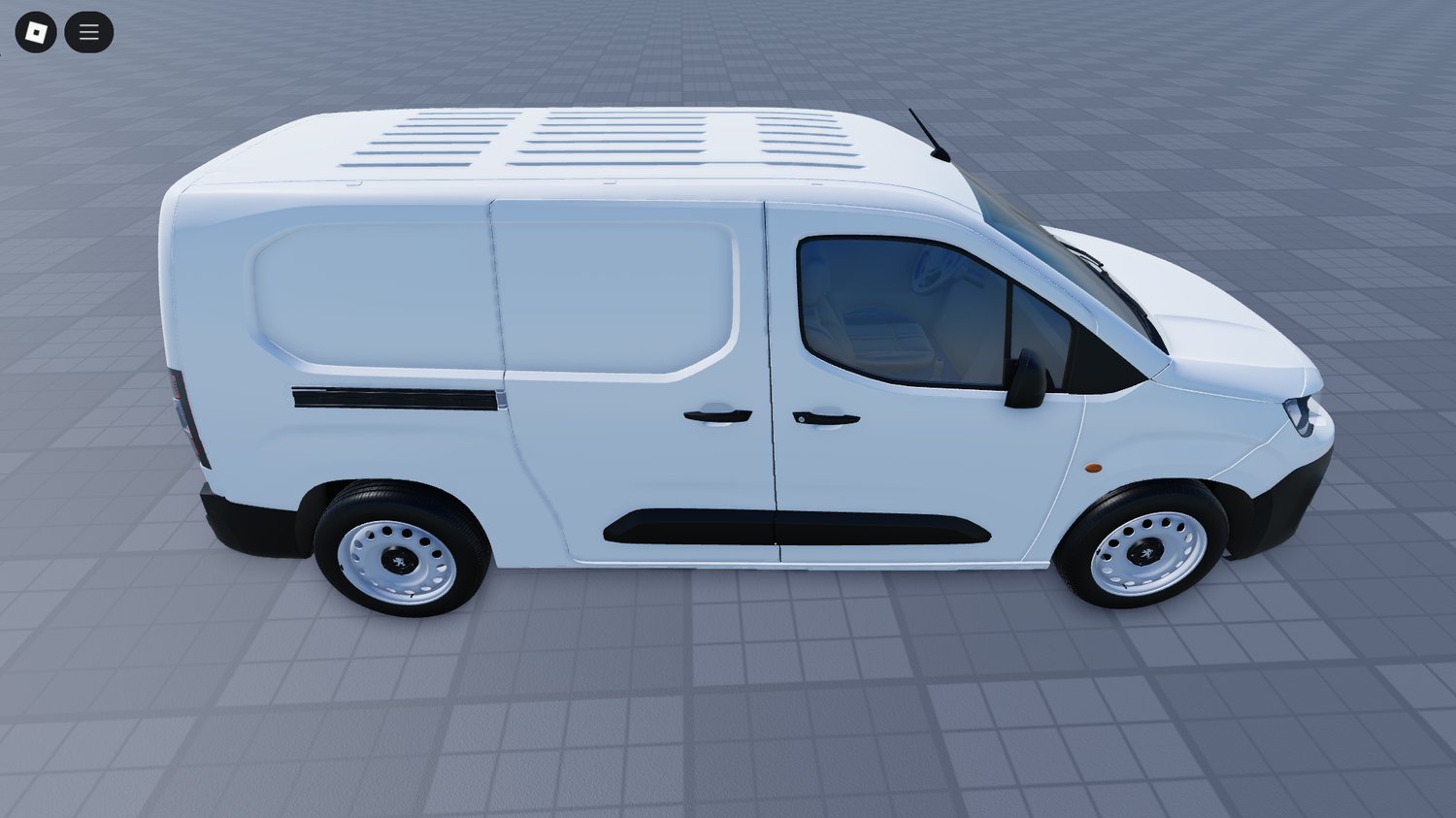 Side view of driveable Peugeot utility van