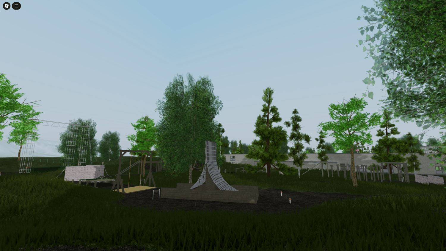 Open field exercise area with assault course and obstacles