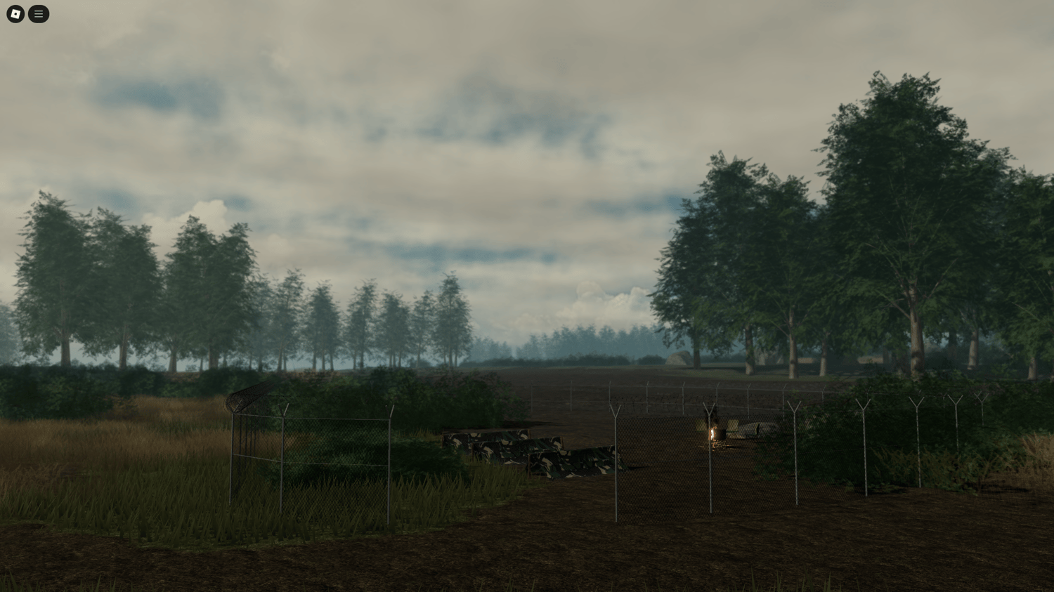 Small fenced military camp with tents