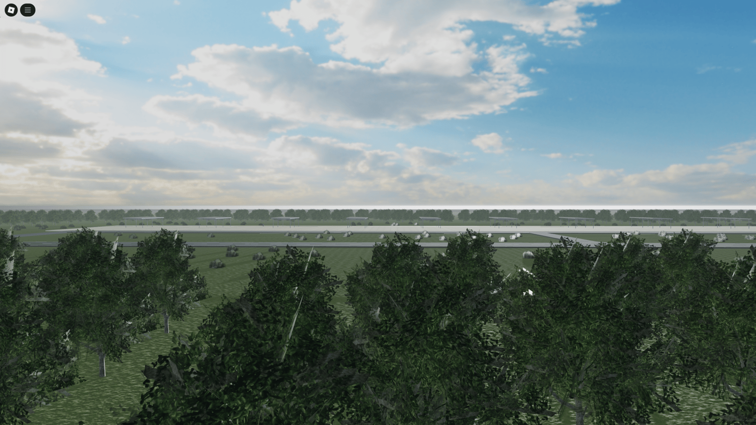 Close-up of hangar shed building  Grass terrain around small airfield