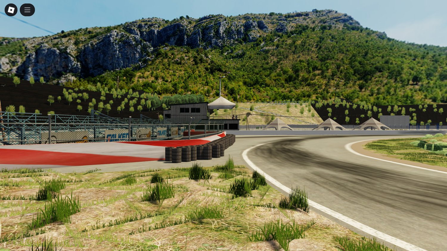 Race-ready environment with barriers, trackside banners, and lighting for Roblox