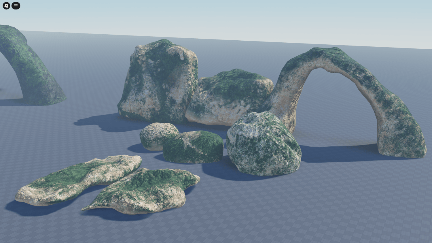 Roblox nature map with scattered rock models