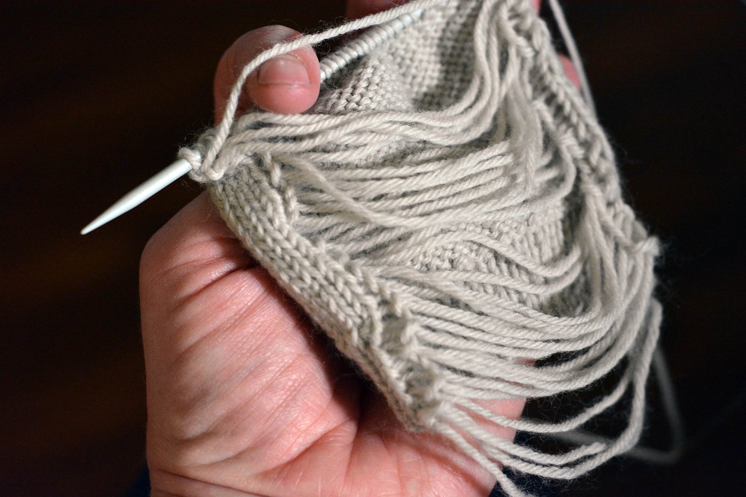 Back of a circular knitting swatch.