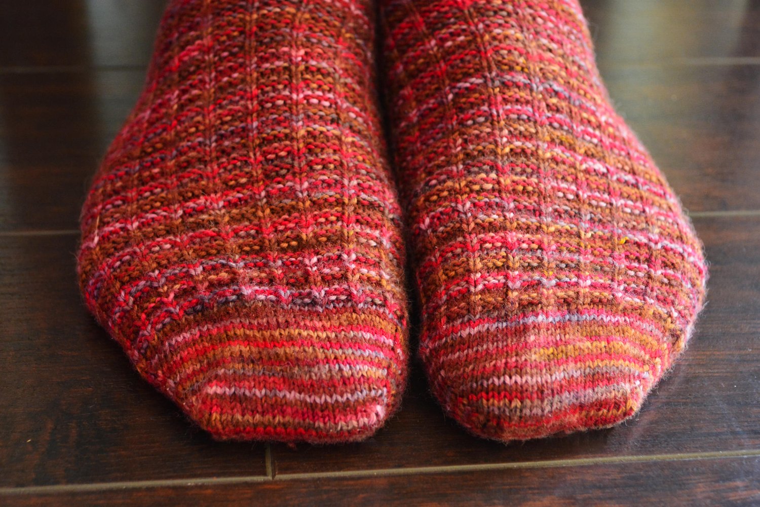 Close-up of sock toes, showing raglan shaping.