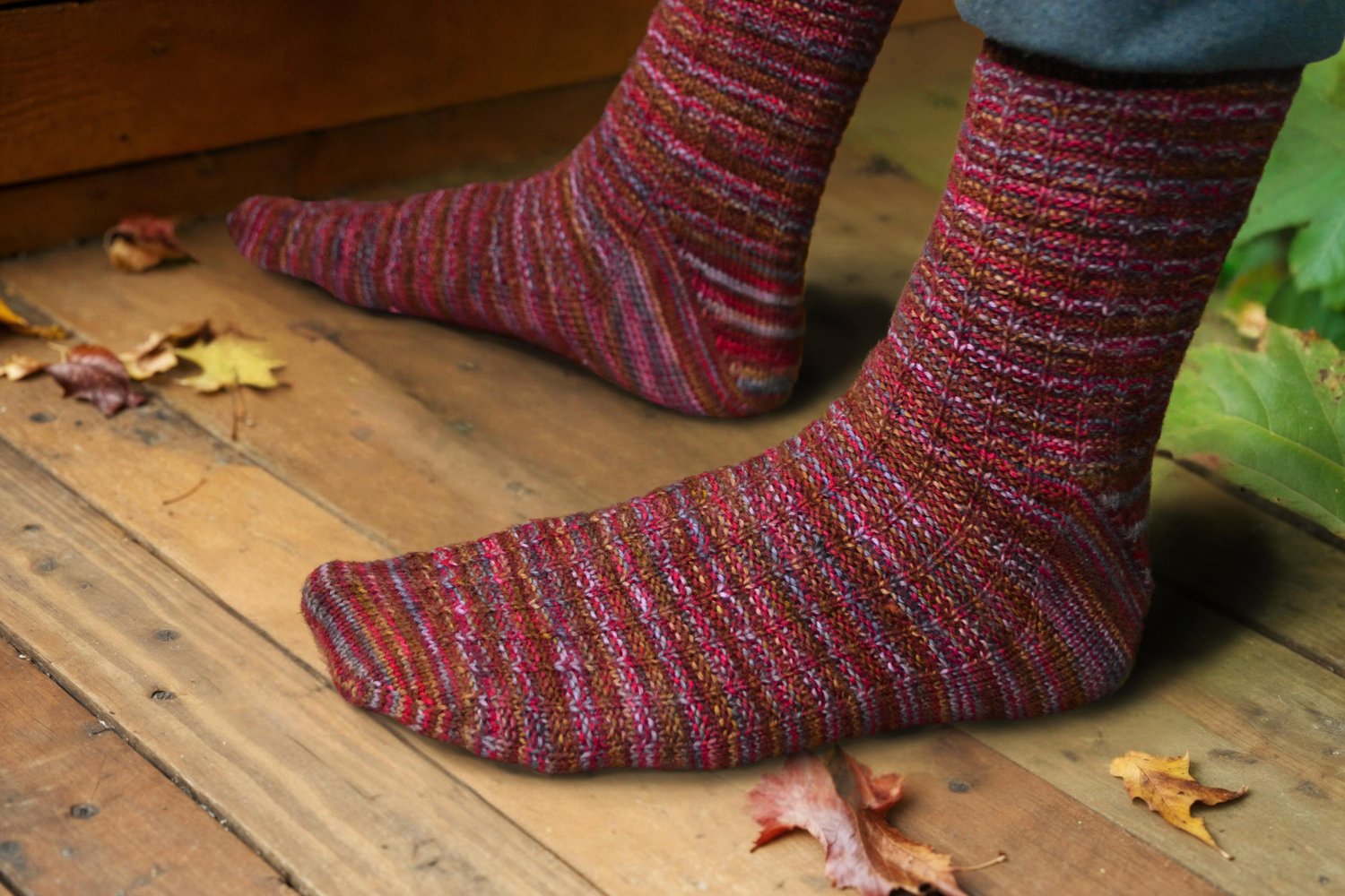 A view of both socked feet from the side.