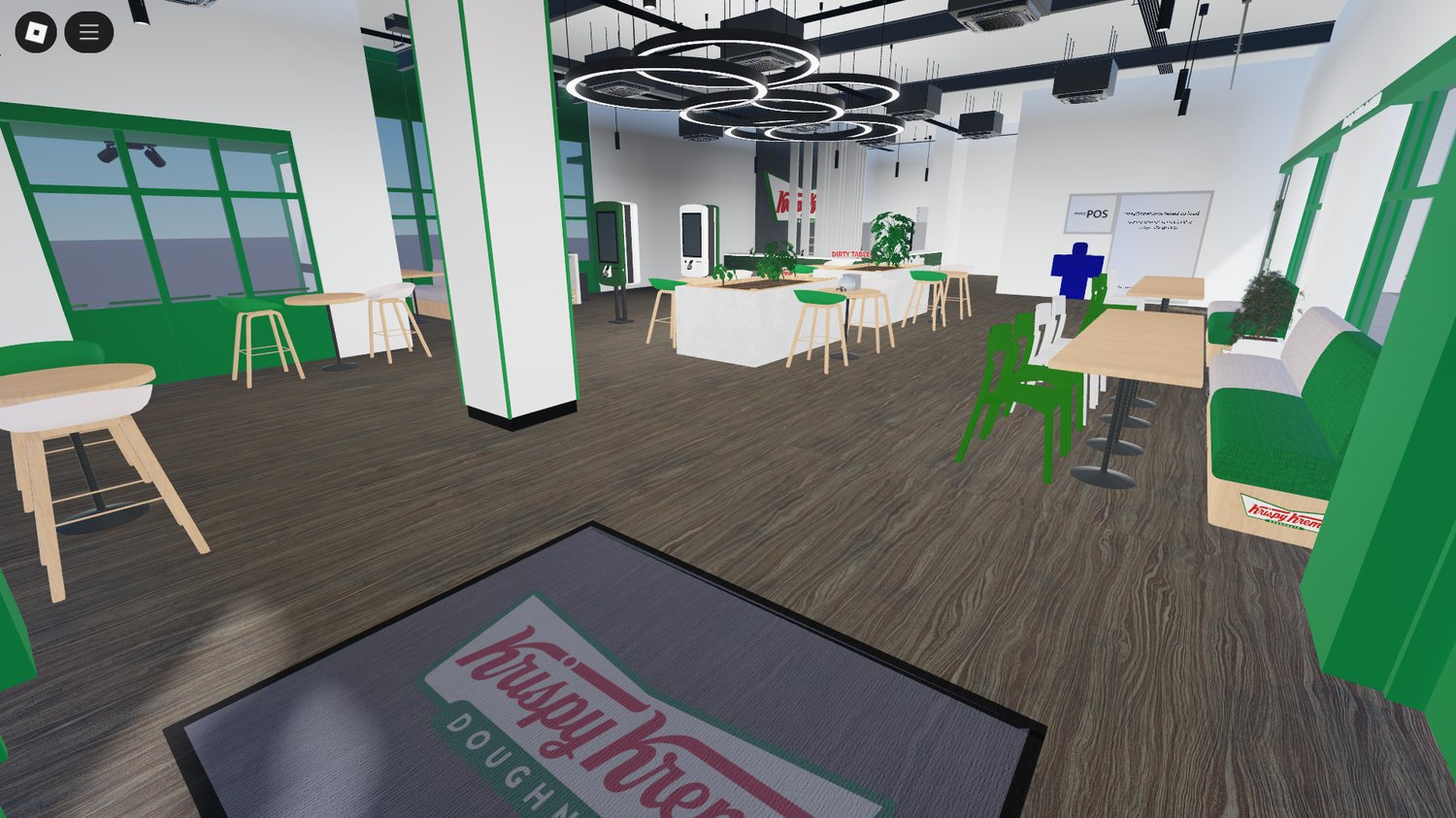Cozy worker meeting area with chairs and table