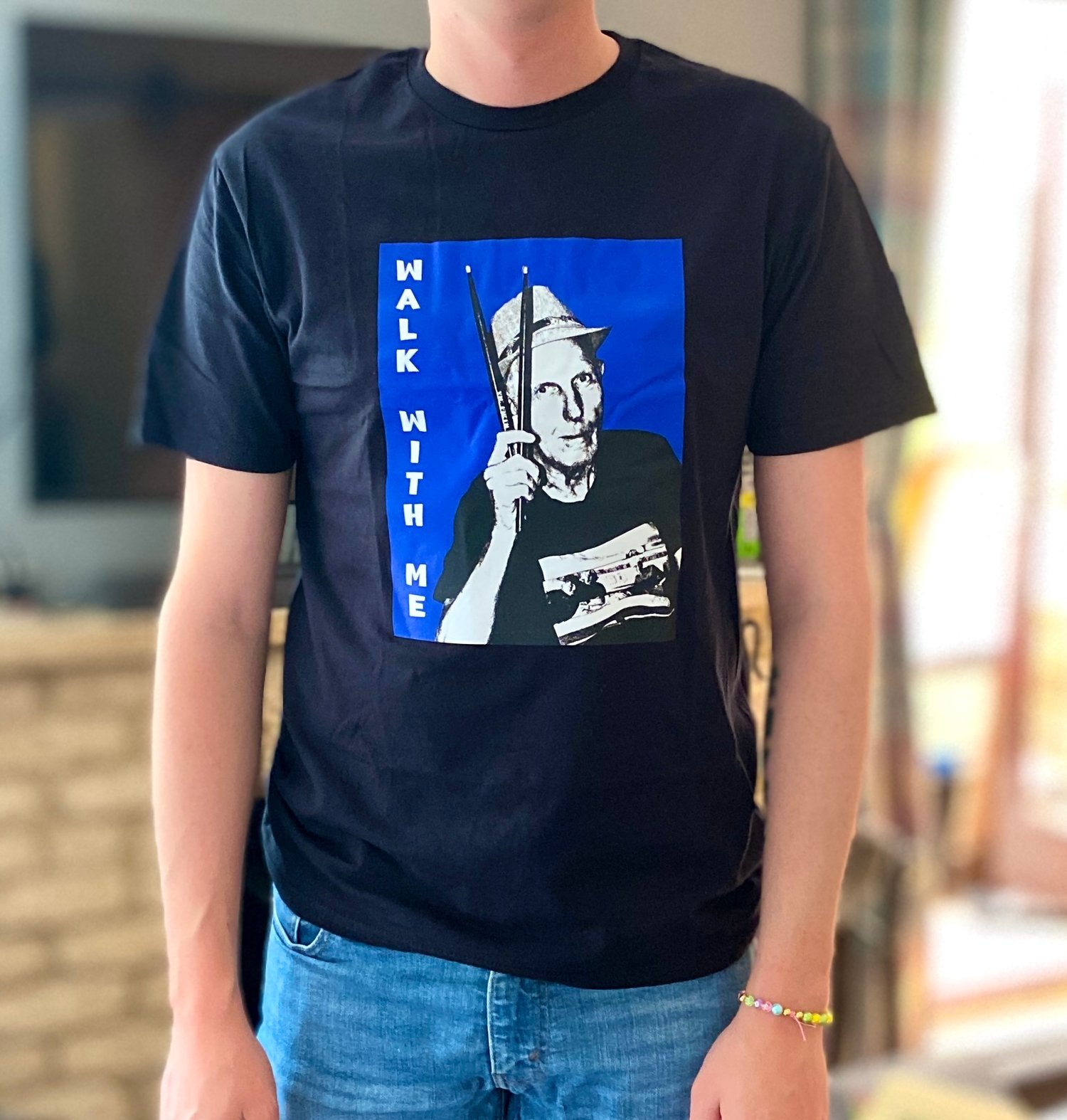 Joe wearing the walk with me tshirt size medium