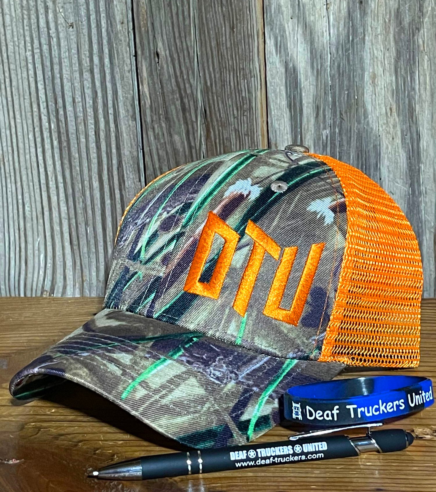 Camo-and-Orange Twill Velcro Trucker Hat with “DTU” Logo