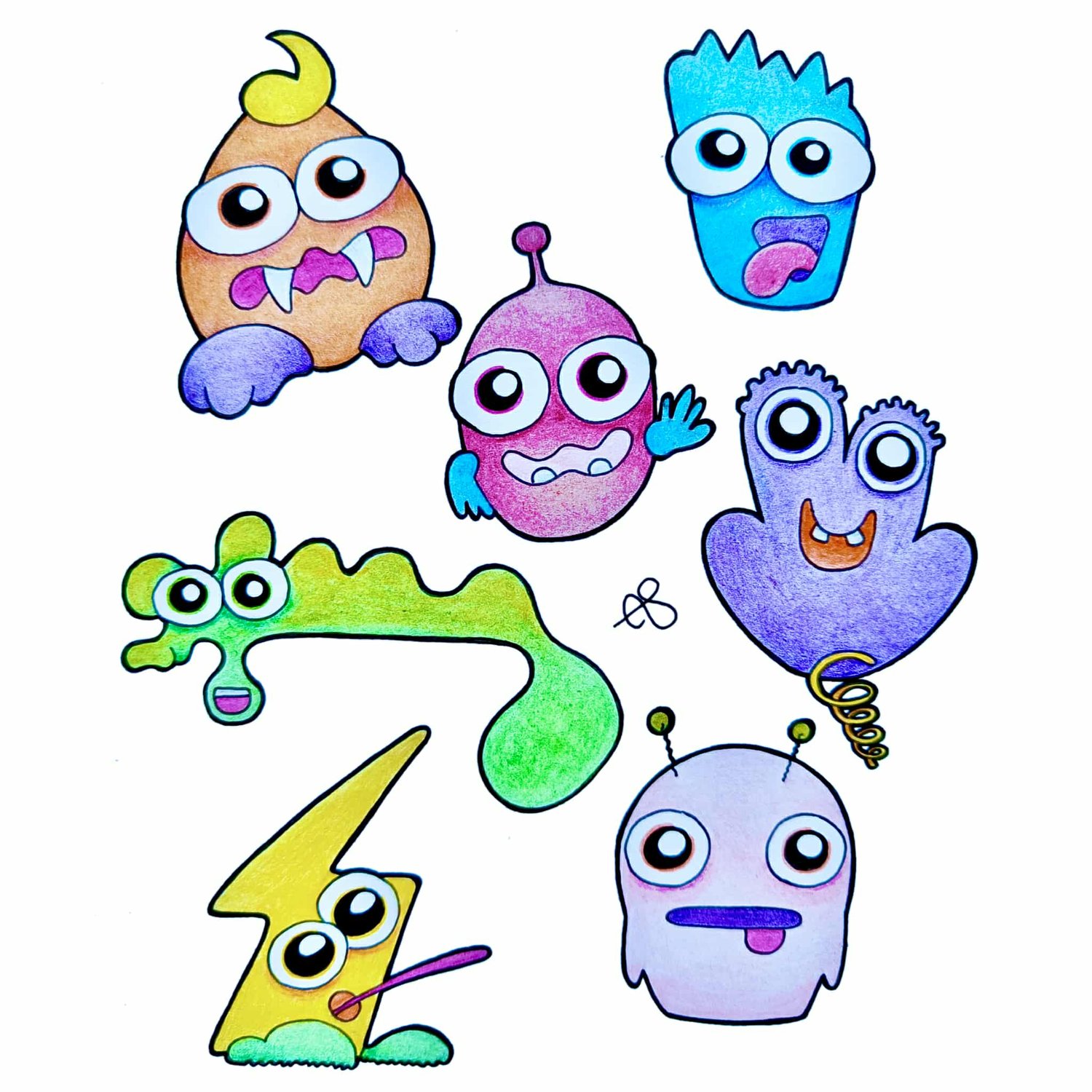 Colorful little cute monsters drawn with markers and colored pencils.