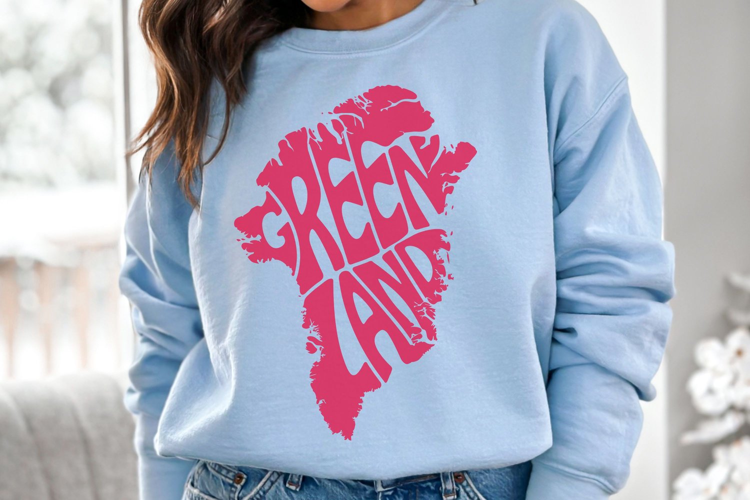 This design features the word Greenland artistically arranged within the shape of the island.