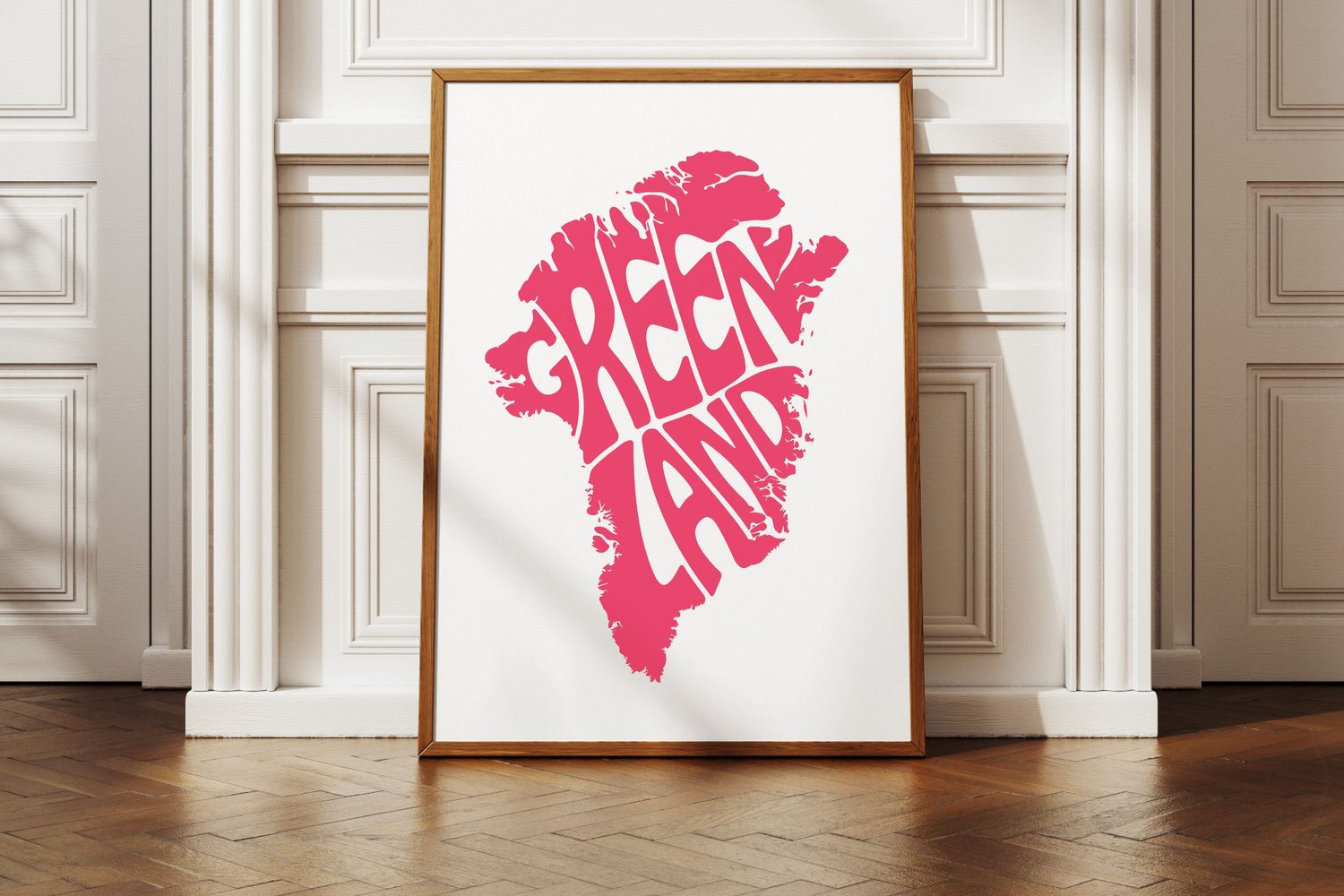 This design features the word Greenland artistically arranged within the shape of the island.