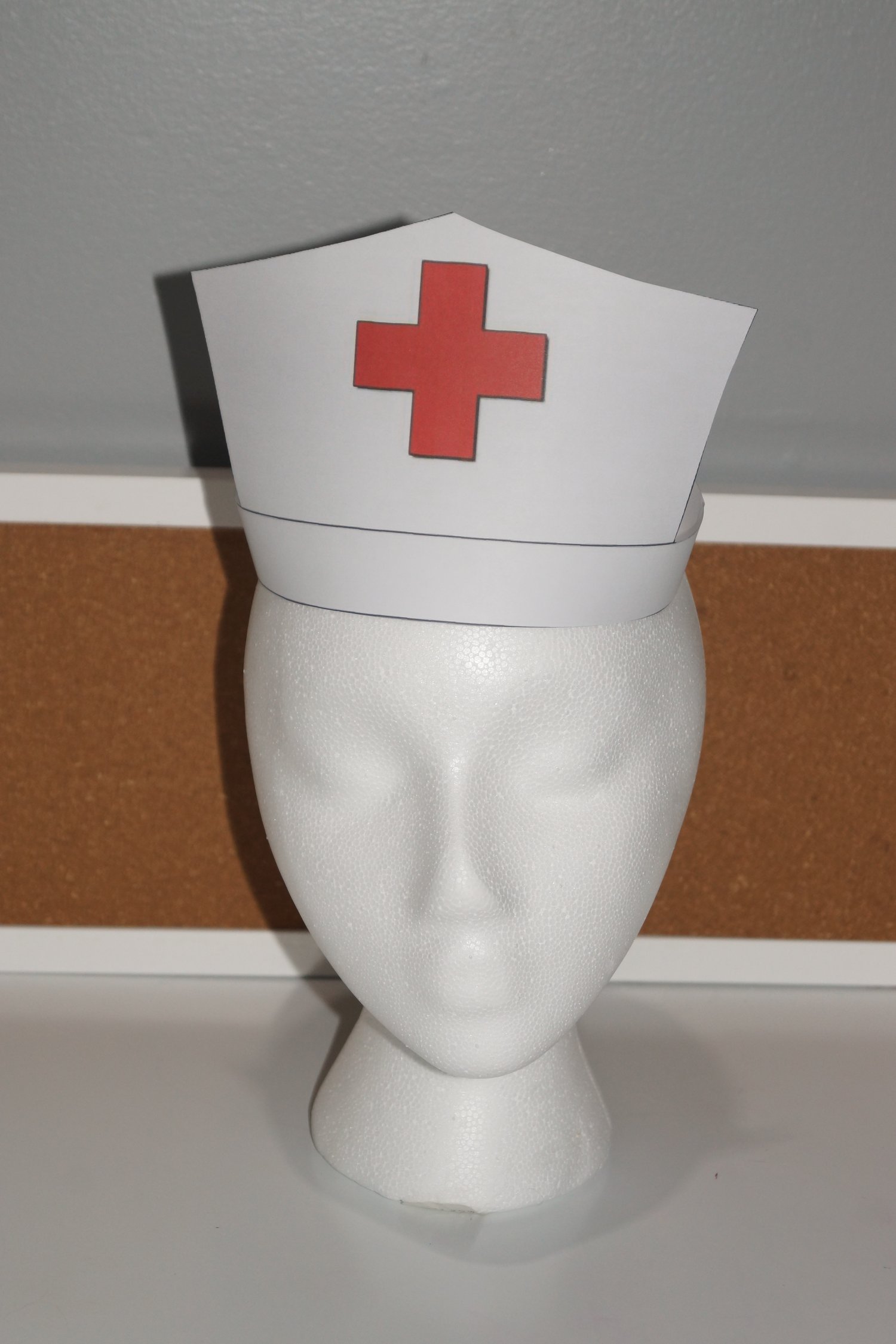 Printable nurse hat dramatic play center props displayed on mannequin