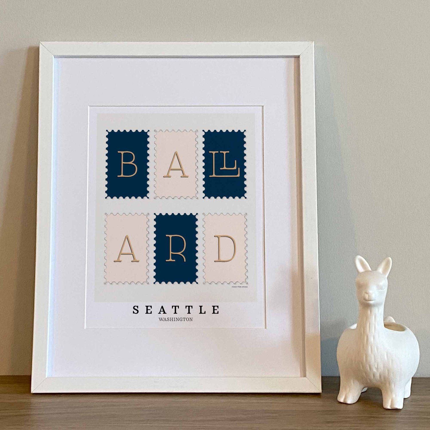 Hand-drawn Ballard wall art in postage stamp style featuring typewriter-inspired lettering in nautical colors