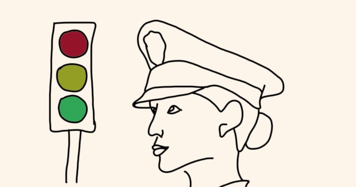 traffic warden and traffic light