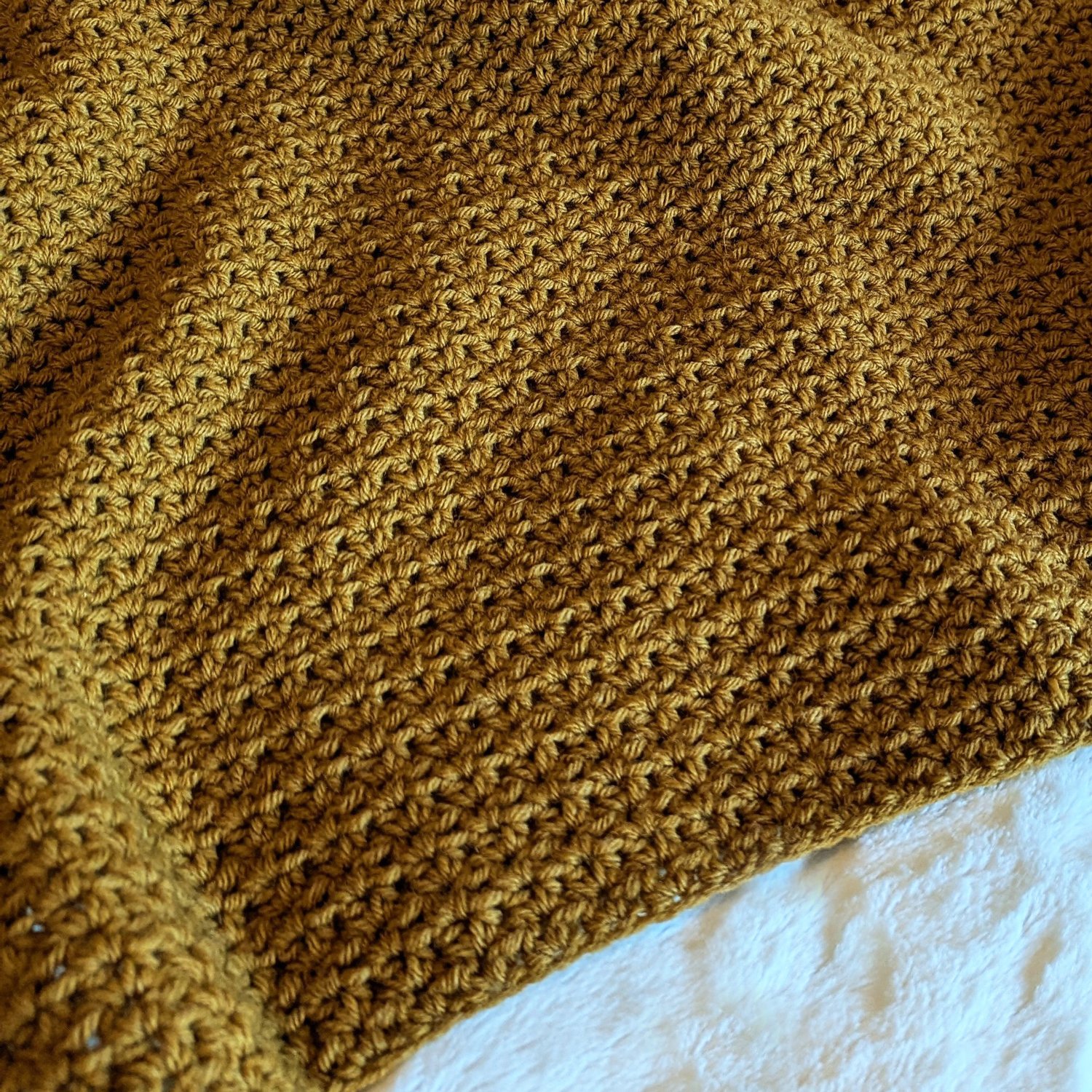 Housewarming Crochet Blanket on Bed