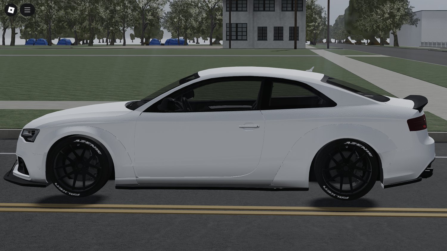 Rear view showing wide fenders and exhausts