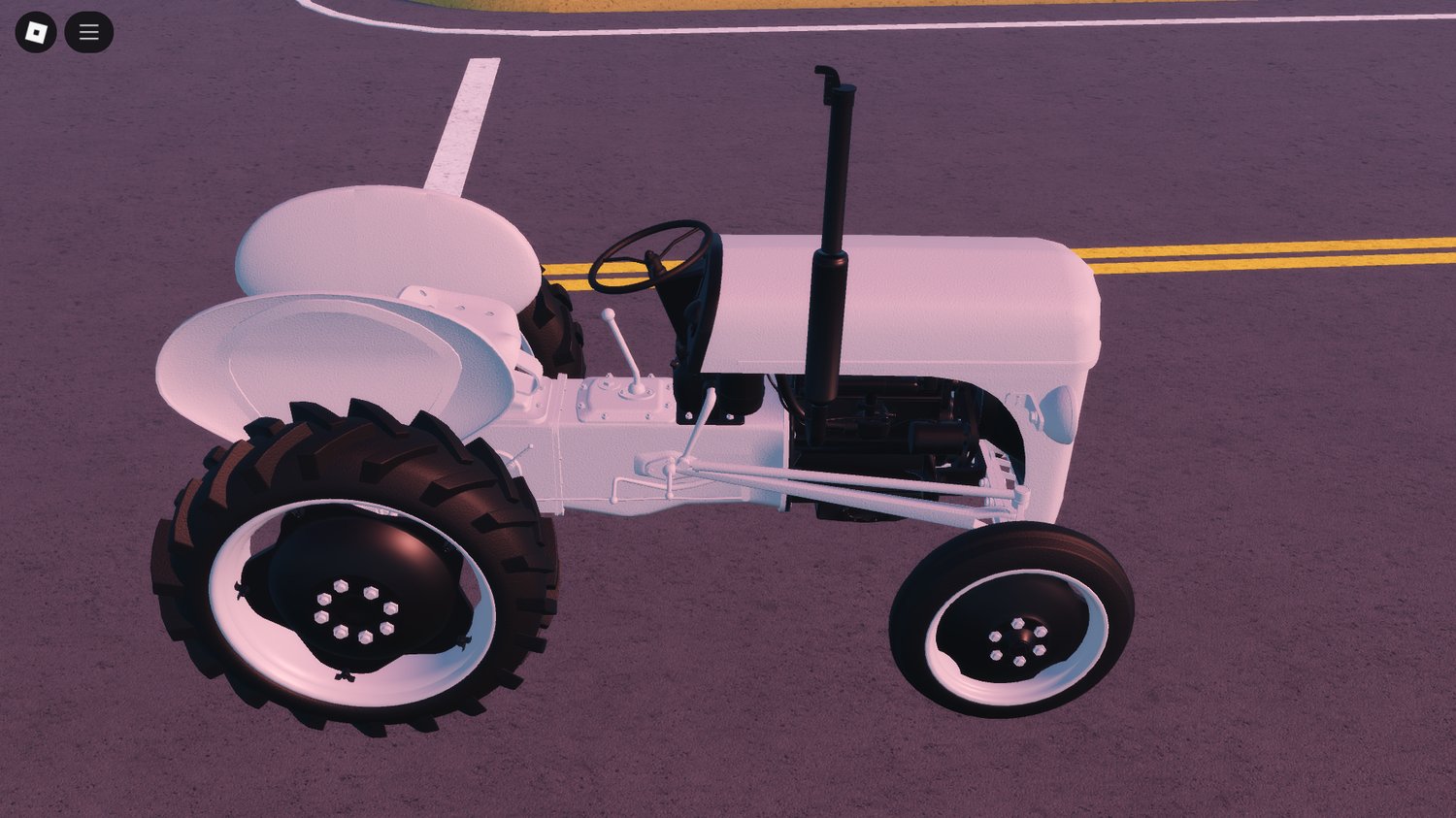 Rear view with hitch and wheel details