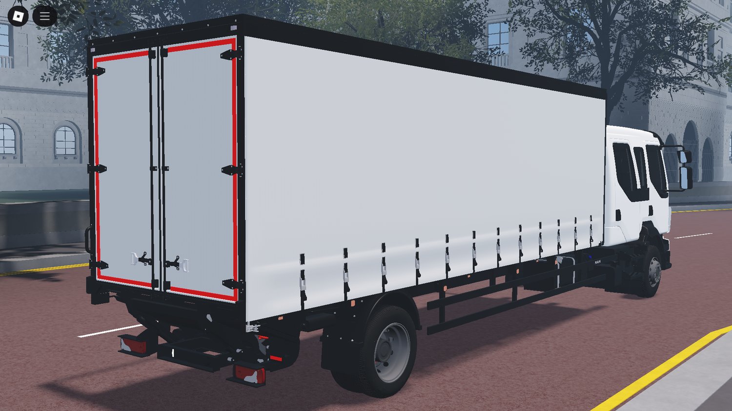 Rear view showing truck chassis and wheels