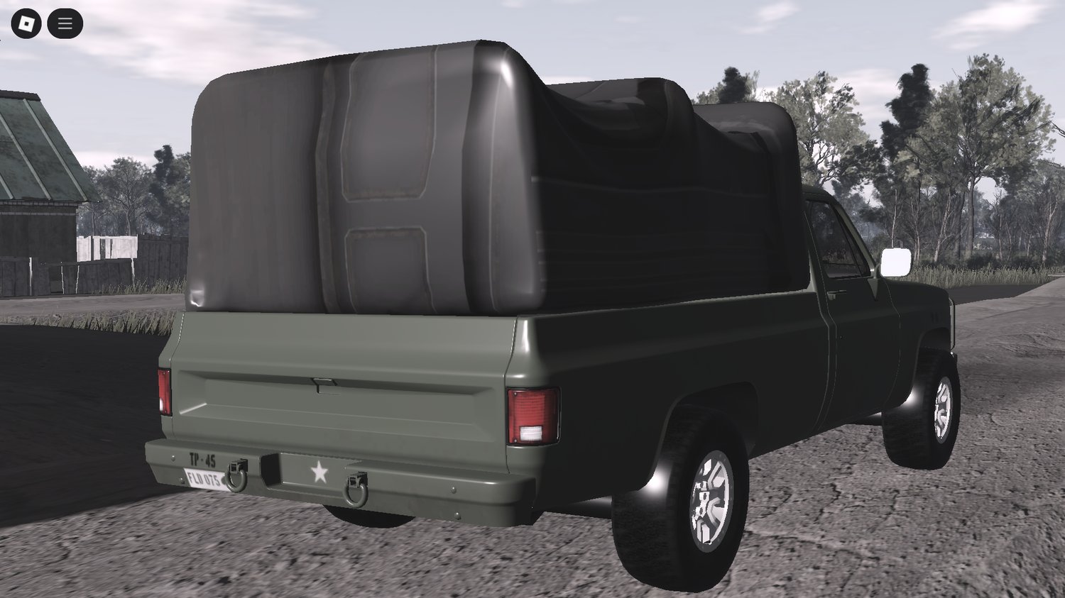 GMC truck parked at Roblox military base