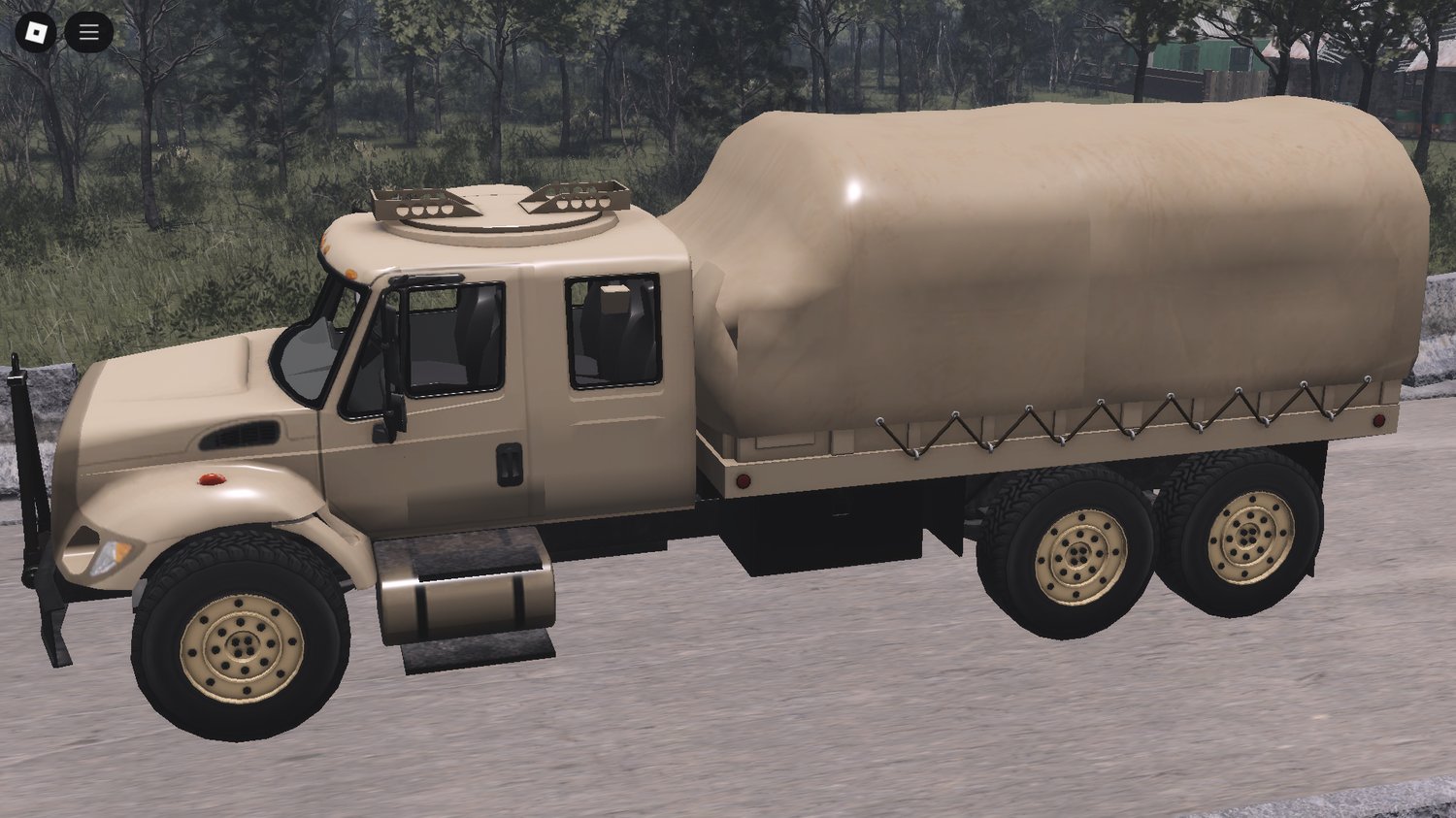 Military truck convoy on road