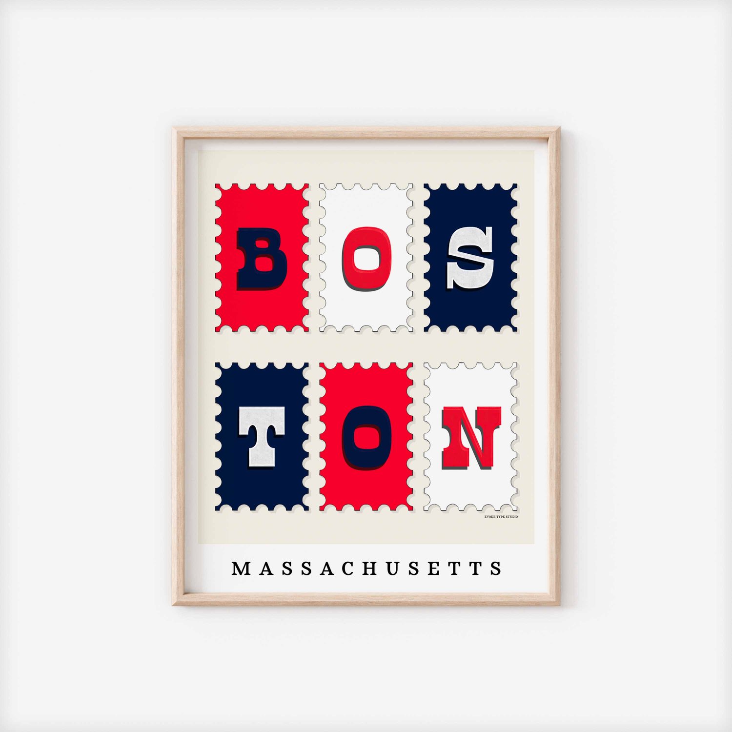 A framed picture of postage stamps featuring Boston, Massachusetts drawn in a unique lettering style. Artwork has a red, white and blue color scheme
