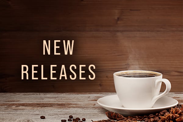A cup of coffee sitting on a table with coffee beans around it. Next to it are the words "New releases".