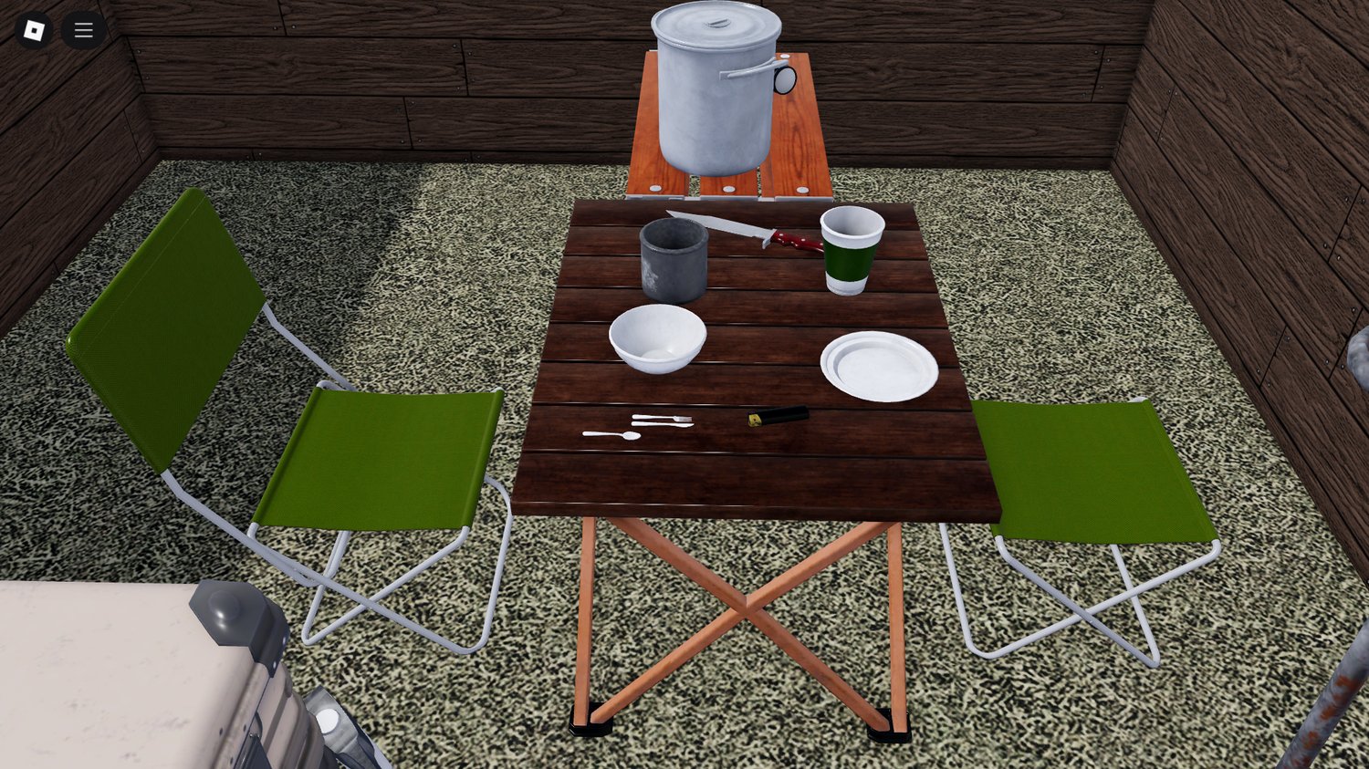 Detailed camping setup with tables, chairs, and grill