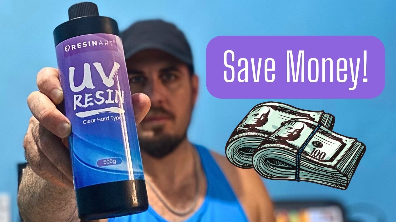 The Fly Guy, Matt Campbell, holding up a 500g bottle of UV resin from Resinart, a budget-friendly option for saving money in fly tying.