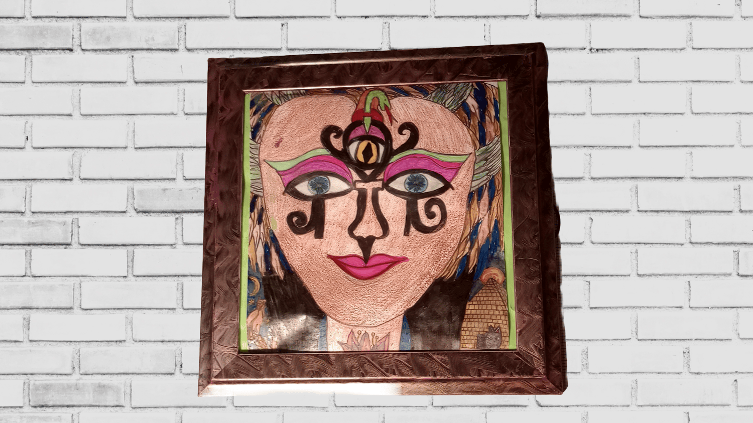 Framed mystical artwork Thea’s Memory, featuring serpent, owl, peacock feathers, cat eye, lotus, and Giza pyramid in a symbolic visionary portrait. Ornate silver frame.