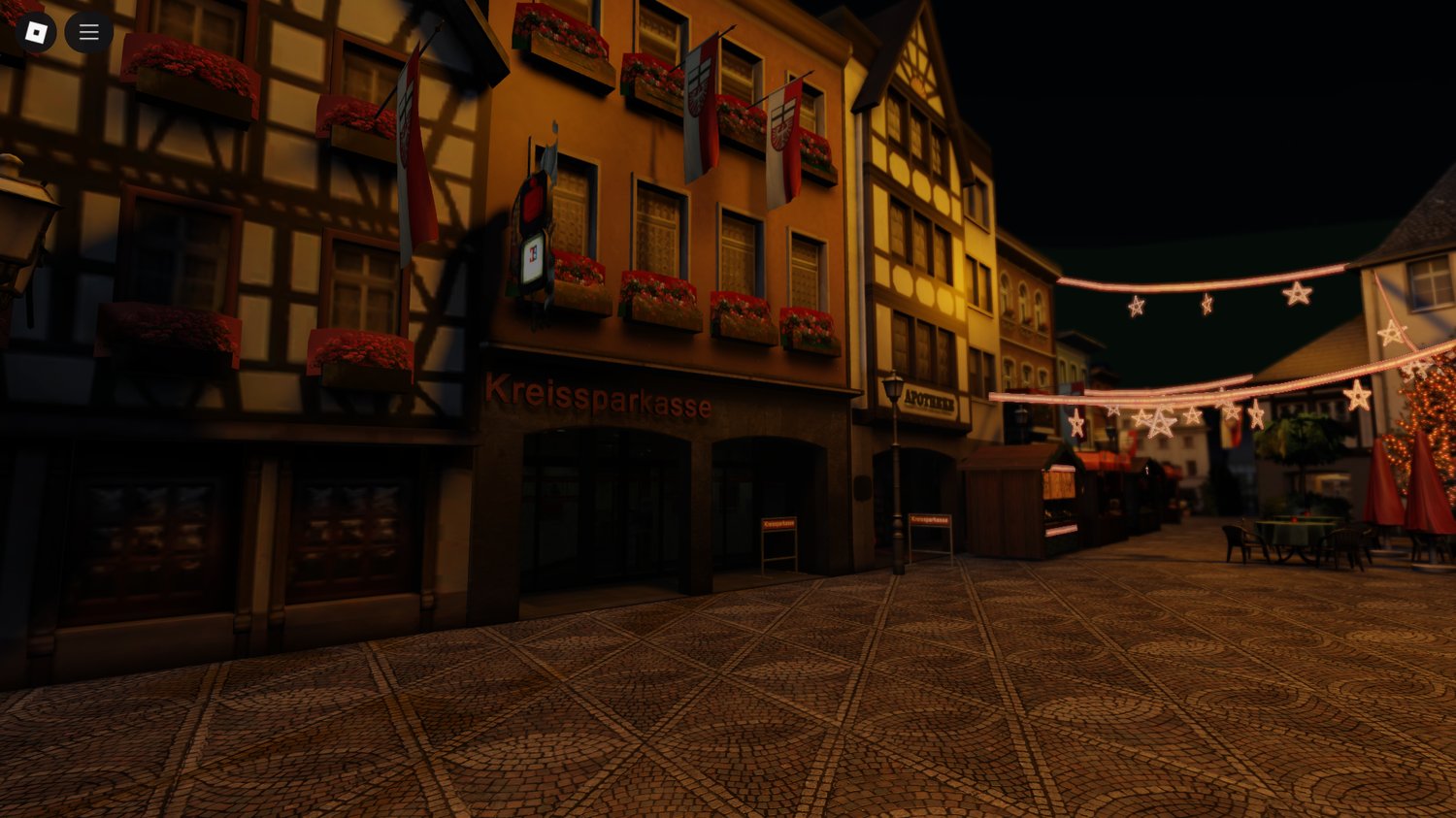 Roblox city at night with glowing lights