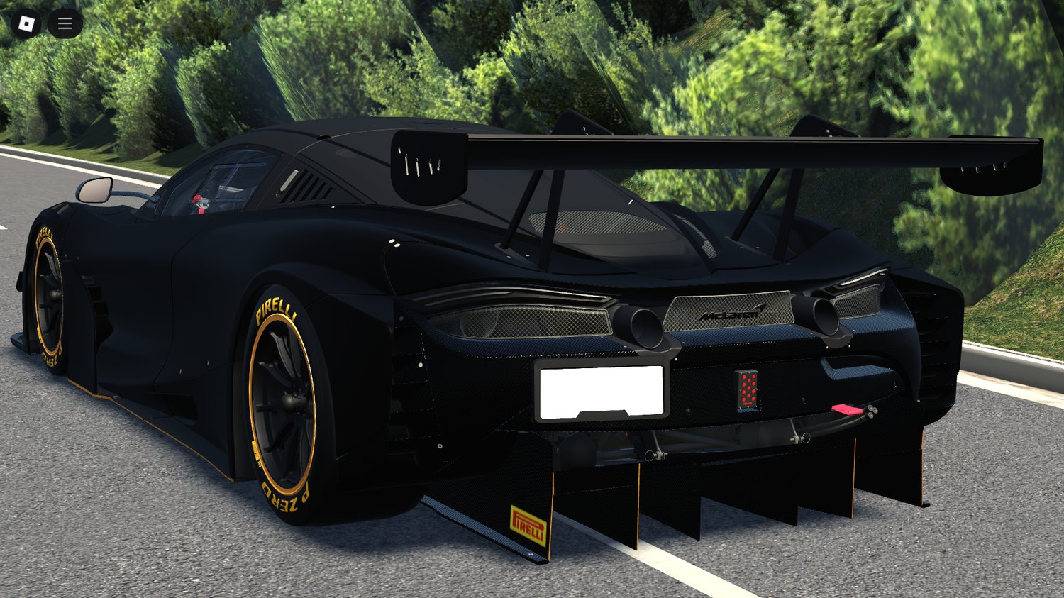 Rear view showcasing aggressive GT3 styling