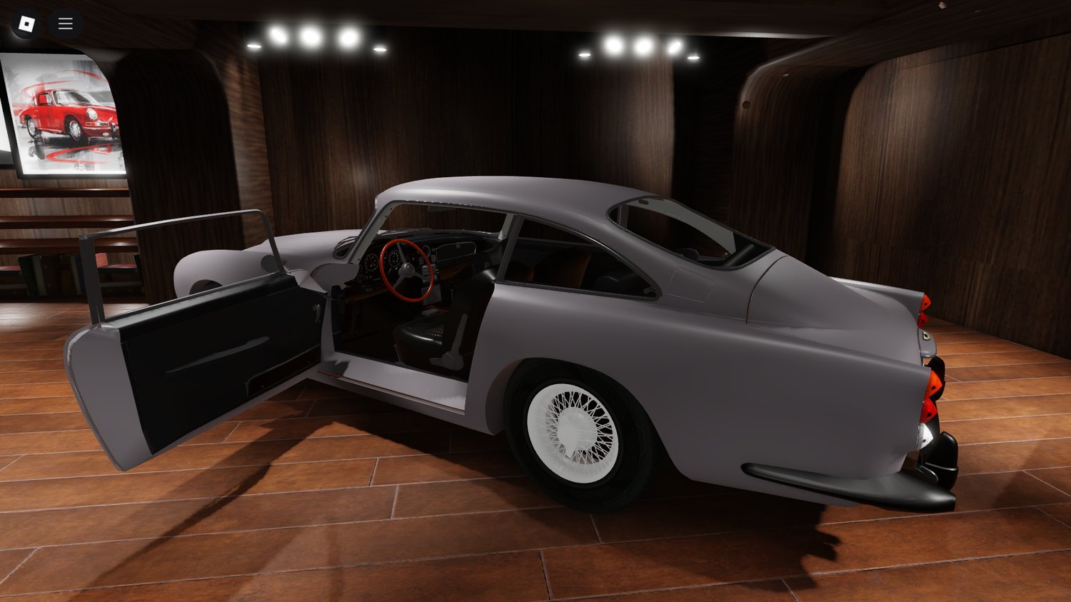 Visitors exploring the car museum environment