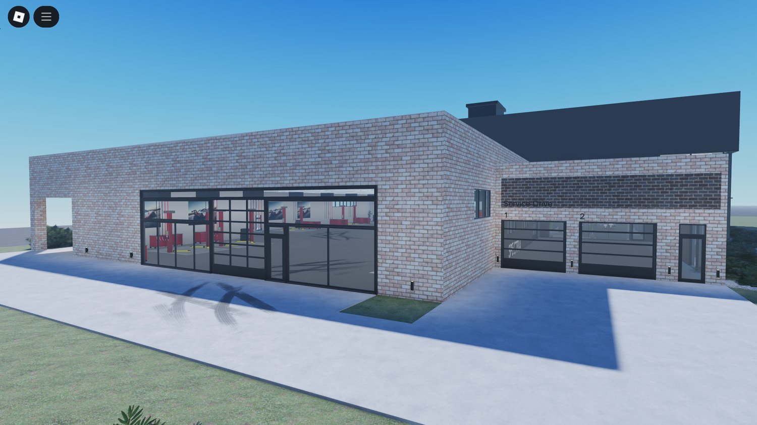 Wide shot of dealership lobby and front desk