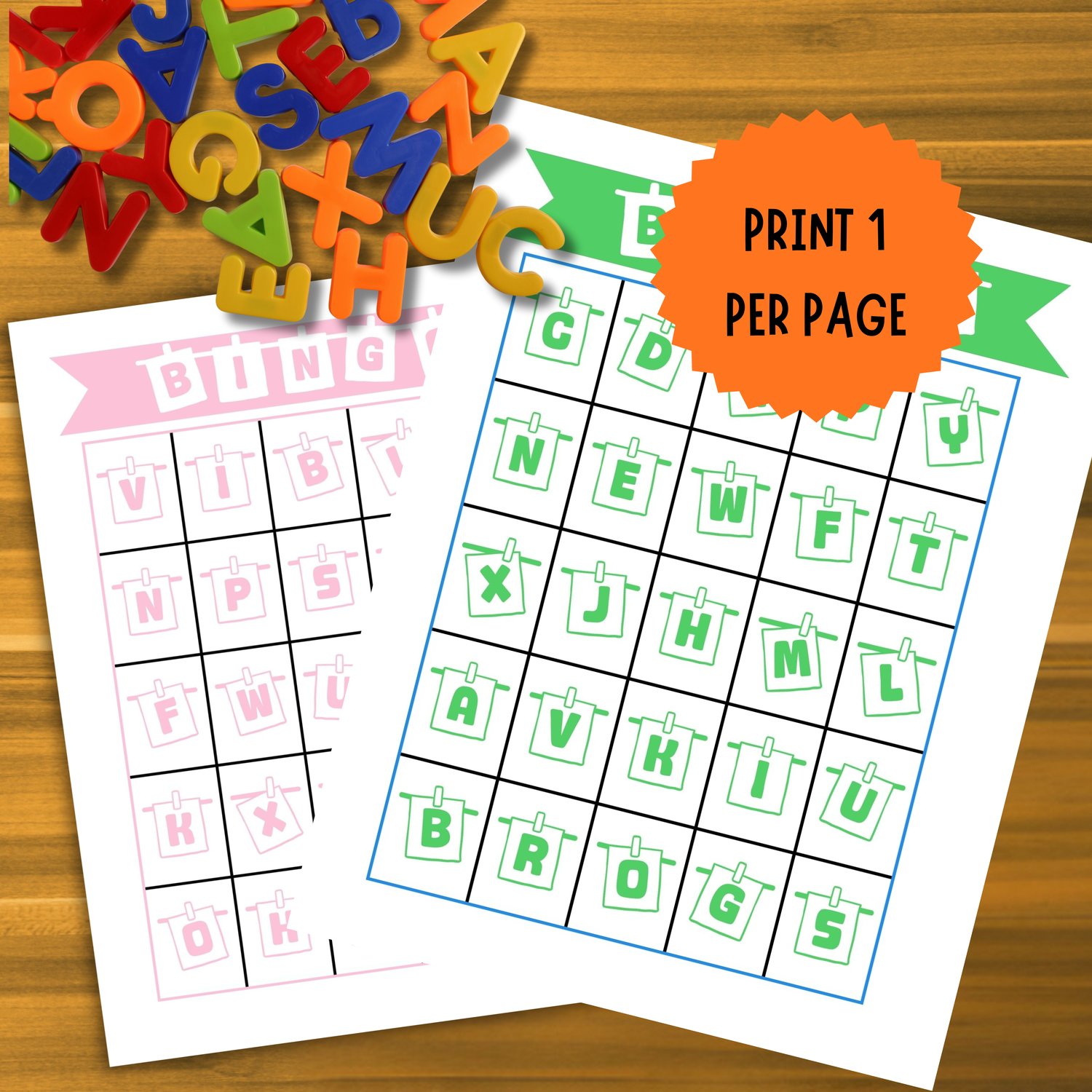 Pink and green alphabet bingo cards with uppercase letters neatly arranged in a grid. Features orange label “Print 1 Per Page,” emphasizing easy-to-use printable format.