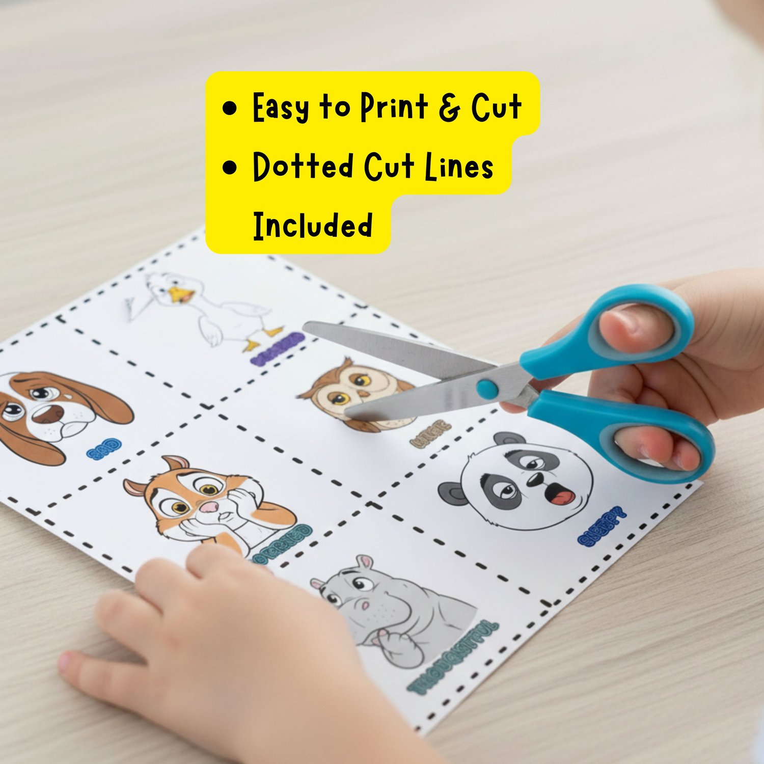 Child cutting printable animal emotion flashcards with scissors, easy to print and cut activity.