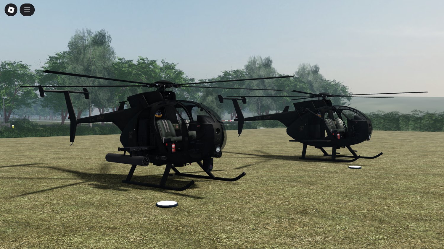Armed AH-6 with mounted weapons in action