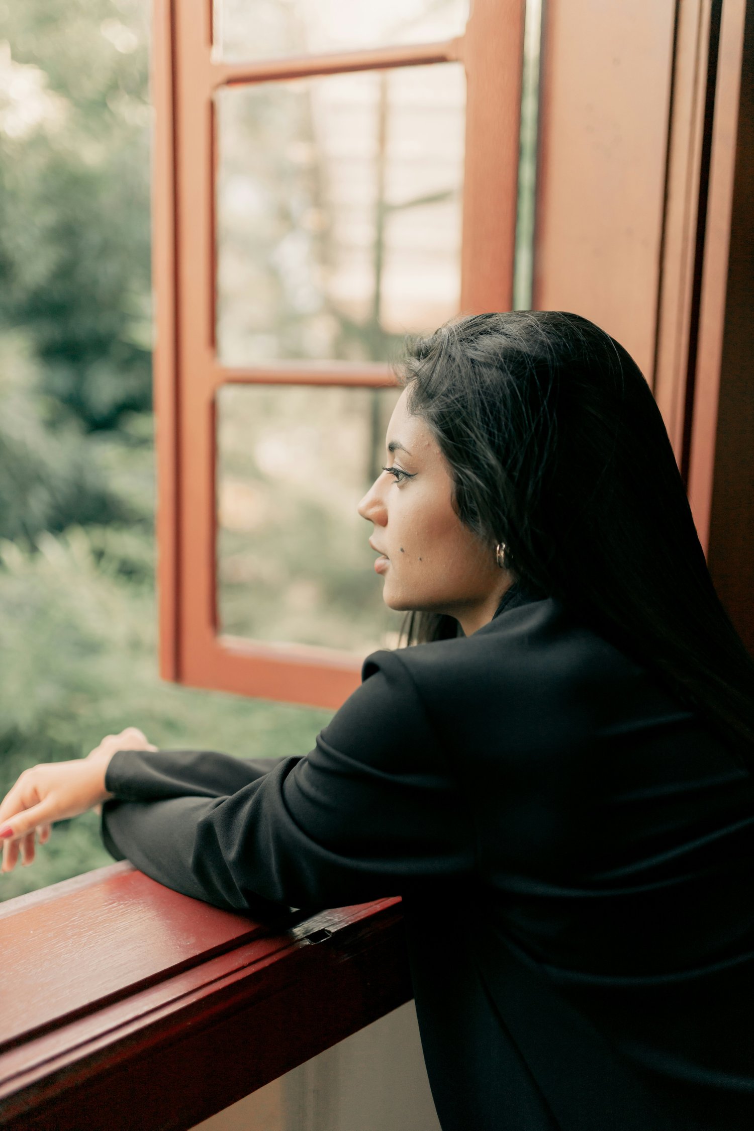 women looking out window