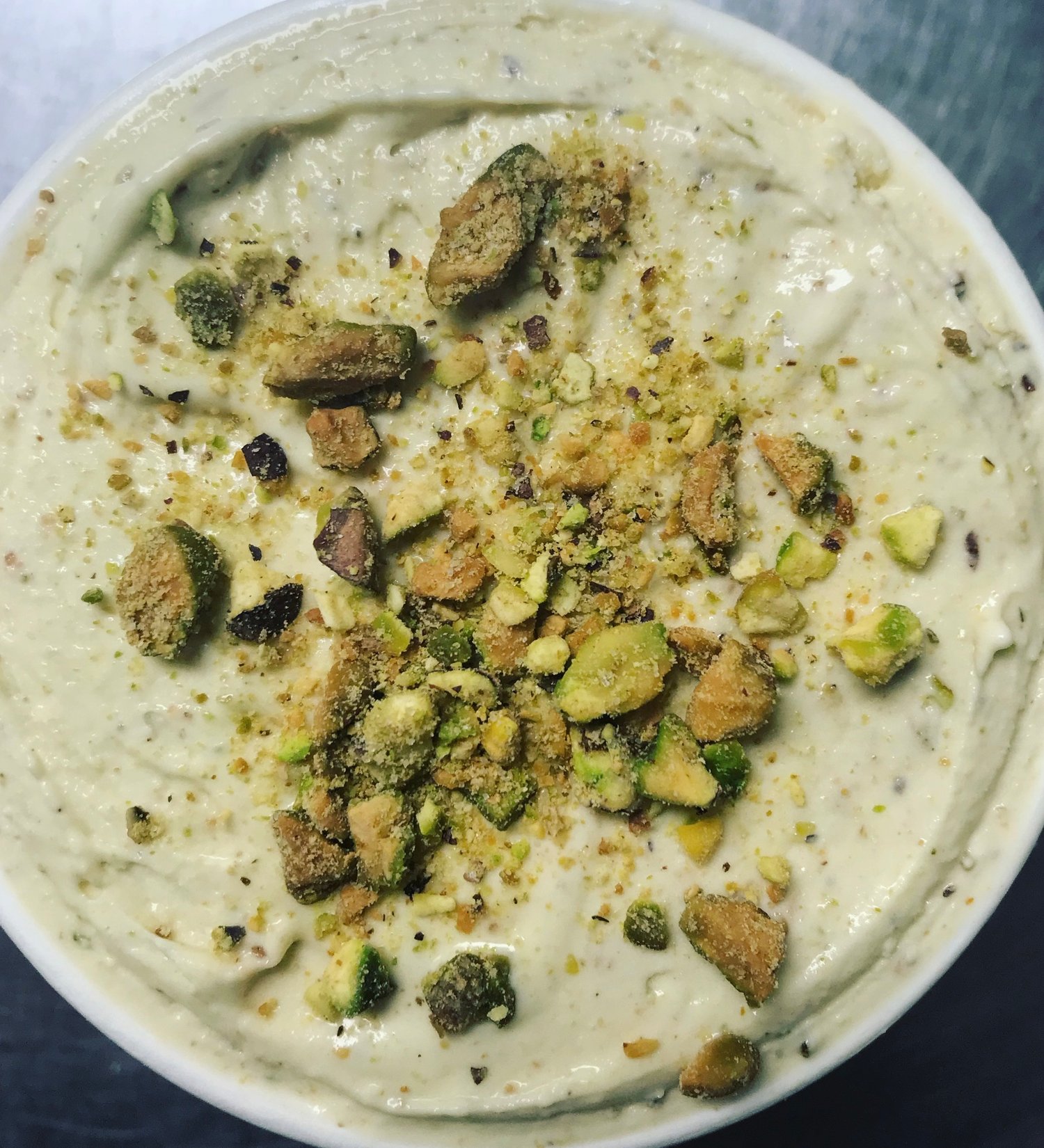 Homemade Chocolate Ice Cream between two Chocolate Chip Cookies