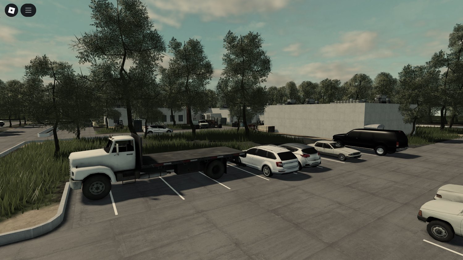 Warehouses surrounded by forest terrain