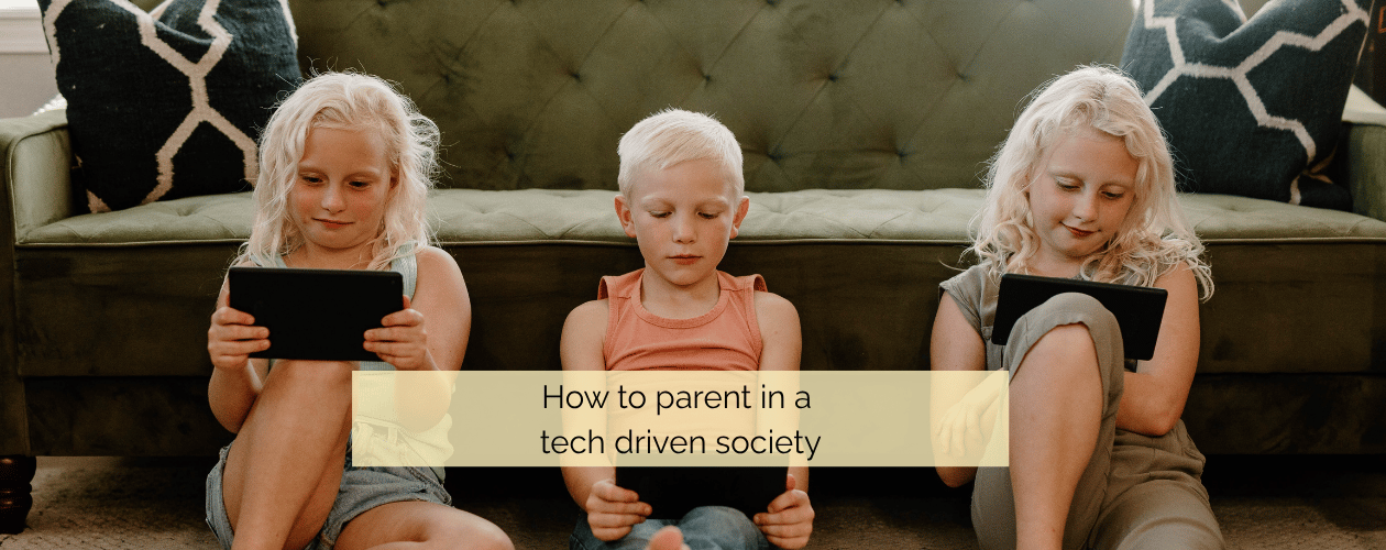 How to parent in a tech driven society - three children sitting looking at digital devices
