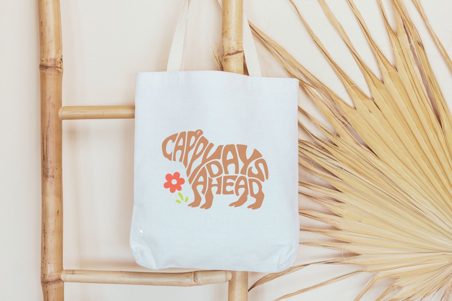 This design features the words Cappy Days Ahead creatively made into a Capybara Shape.