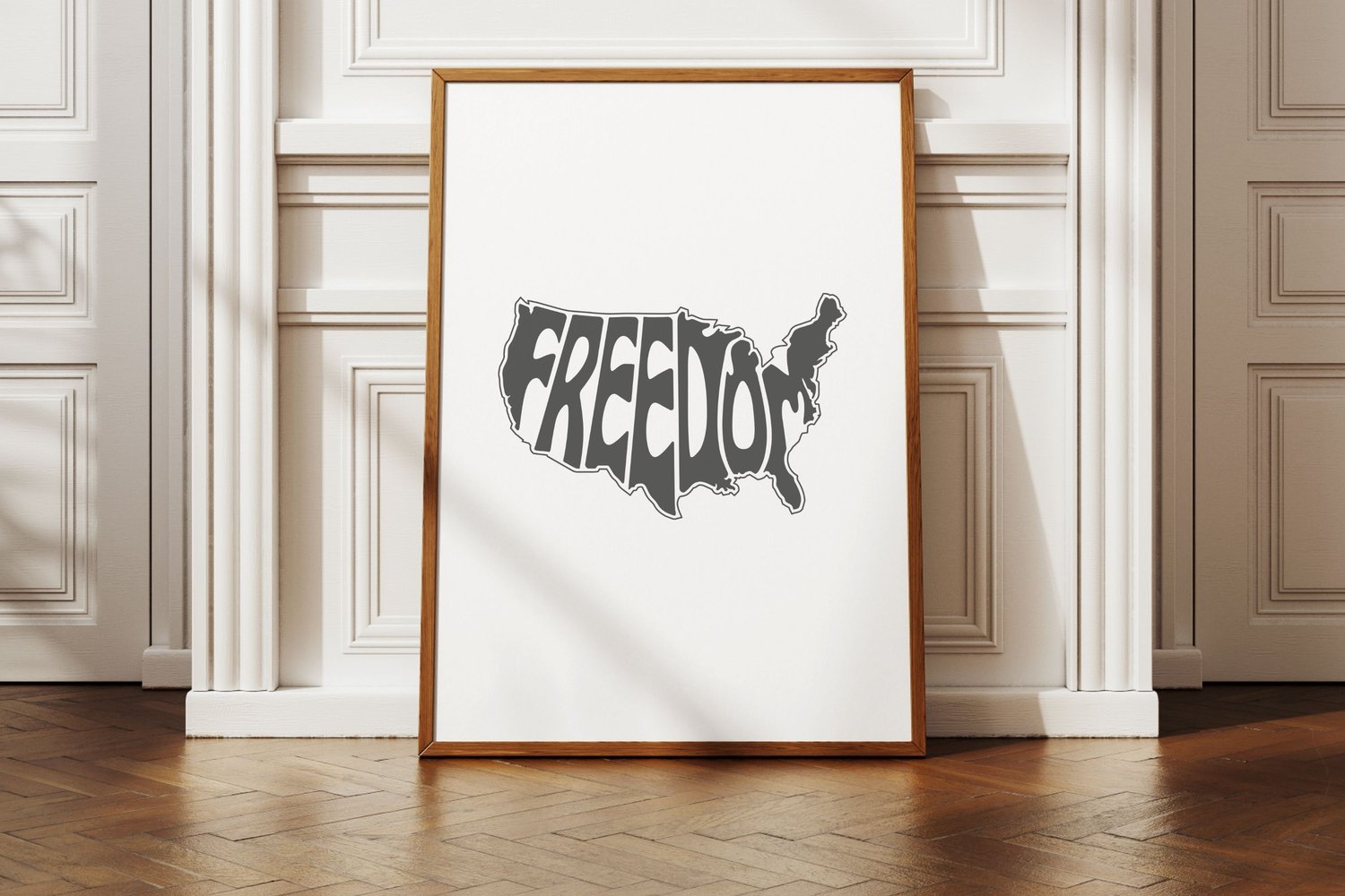 This design features the words Freedom creatively integrated onto the shape of United States of America.