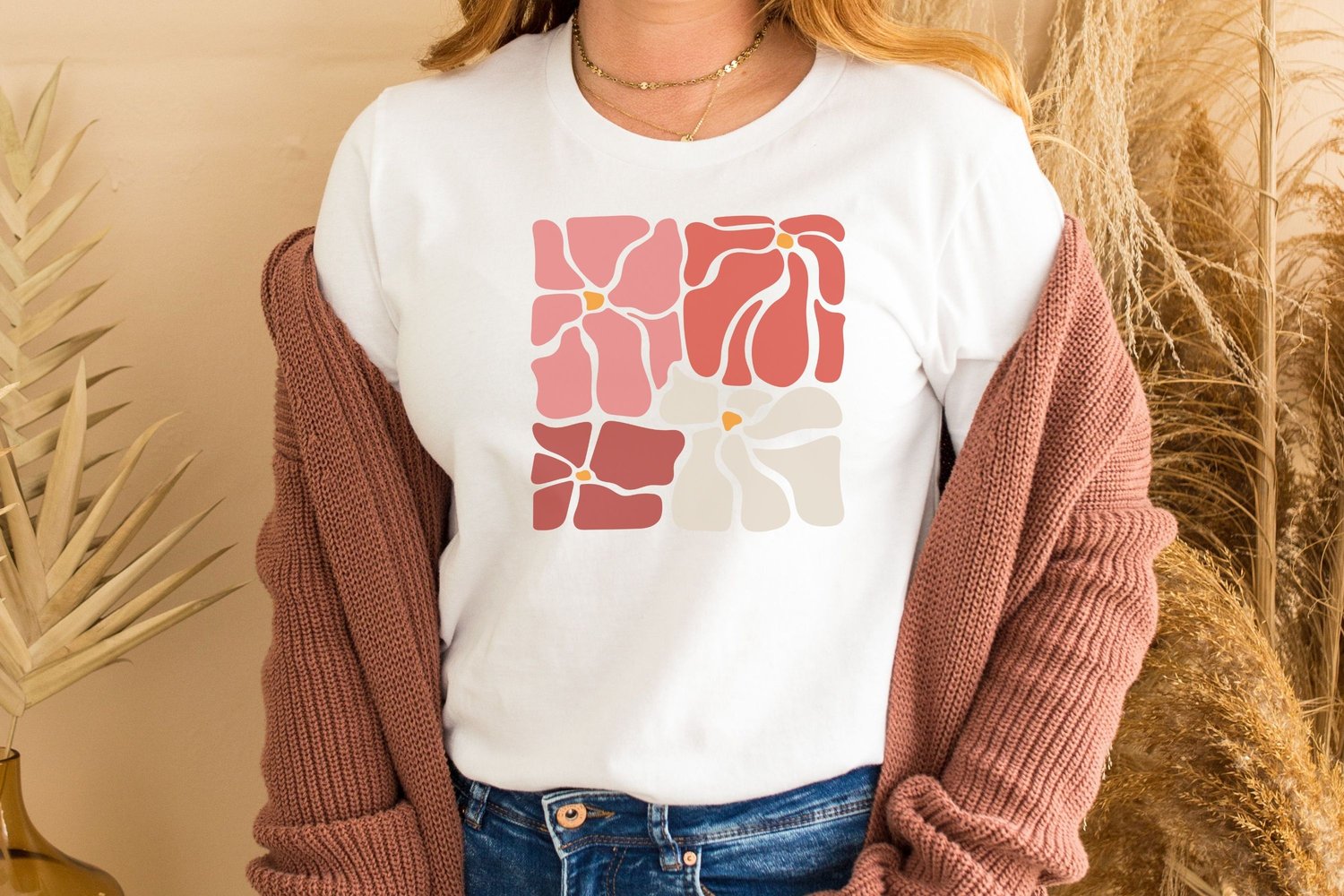 Bring a touch of modern art to your home with this abstract floral design. Featuring organic, flowing shapes in warm red, blush, and cream tones, this botanical poster adds a minimalist and sophisticated vibe to any living space.