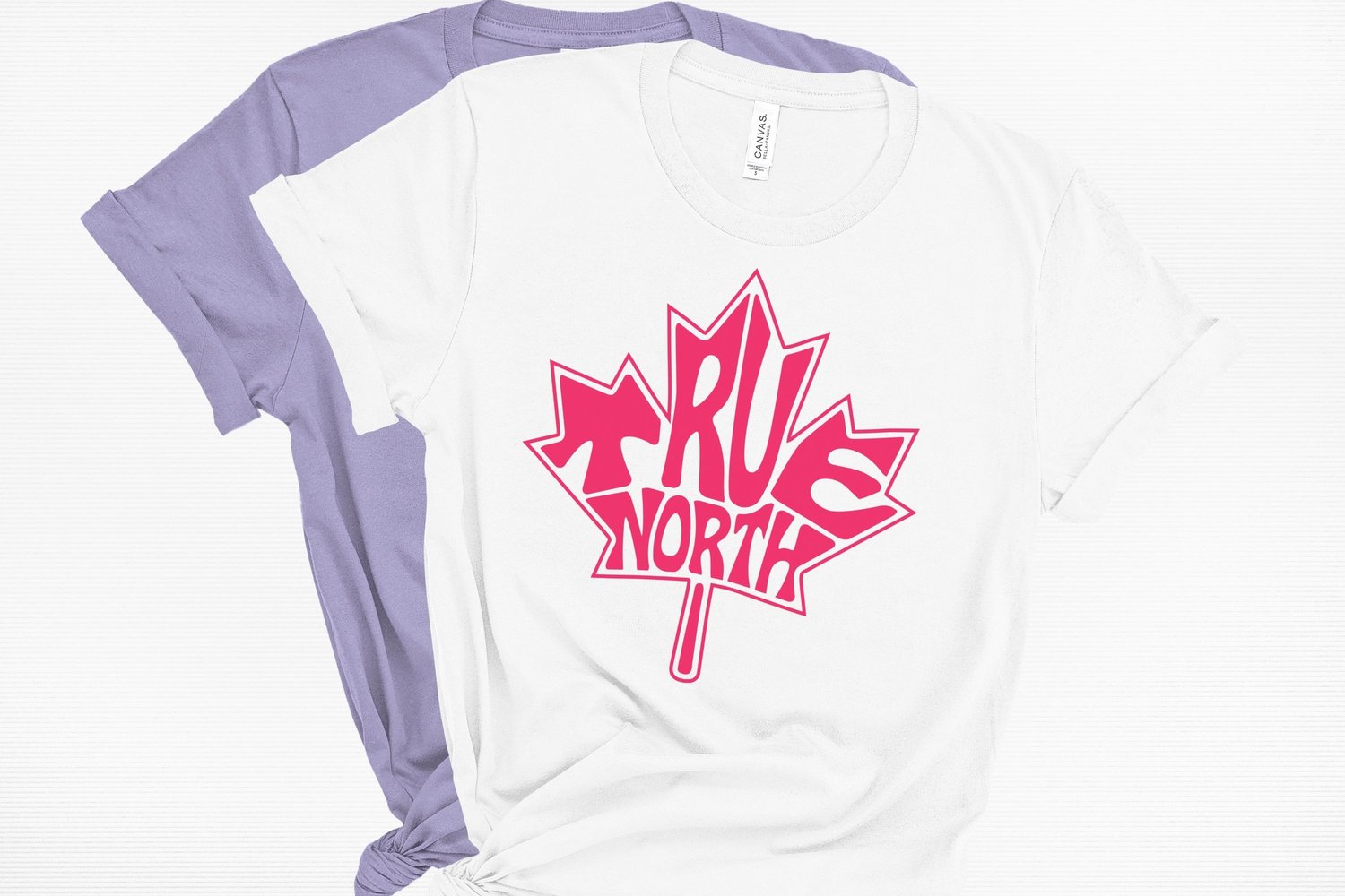 This design features the words True North creatively made into the shape of a maple leaf.