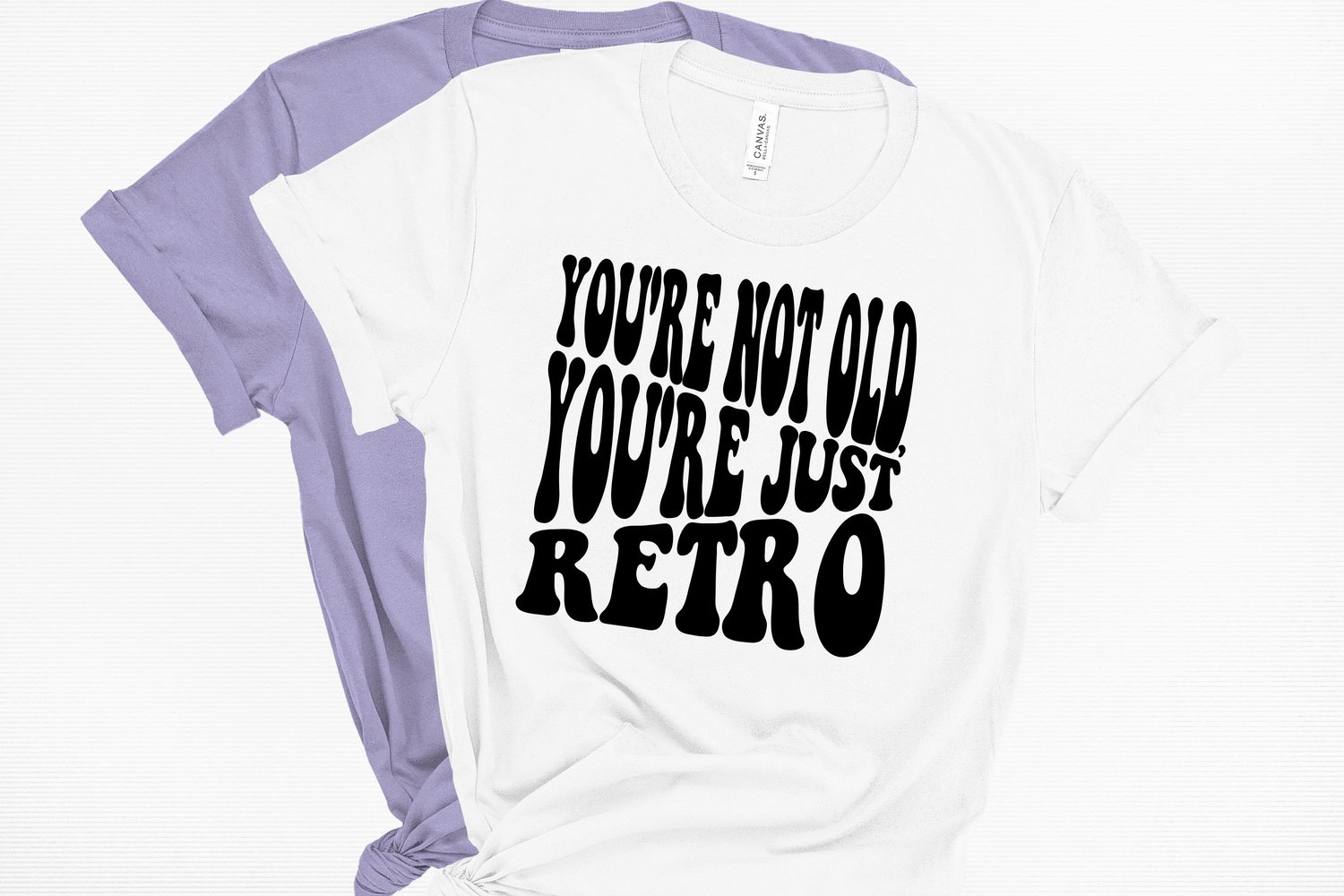 This design features the words Youre not old Youre just retro, creatively made into the shape of a square.