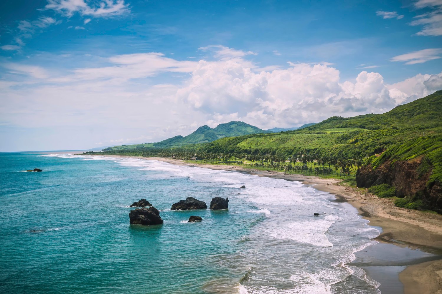 coastal wall art, tropical ocean photography, beach landscape print, mountain and sea decor, palm tree shoreline photo, tropical paradise artwork, blue ocean canvas, exotic beach scenery, nature inspired decor, seaside wall art