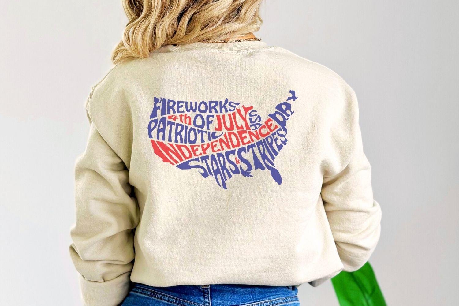 This patriotic design features the words: Patriotic, Fireworks, Stars and Stripes, Independence Day and 4th of July, creatively arranged within the silhouette of the United States.