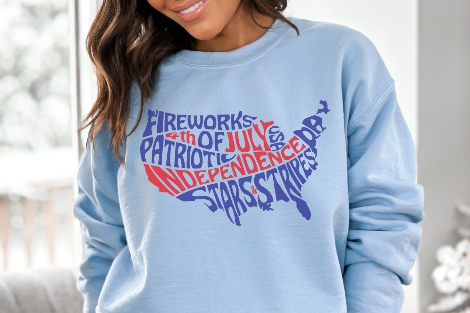 This patriotic design features the words: Patriotic, Fireworks, Stars and Stripes, Independence Day and 4th of July, creatively arranged within the silhouette of the United States.