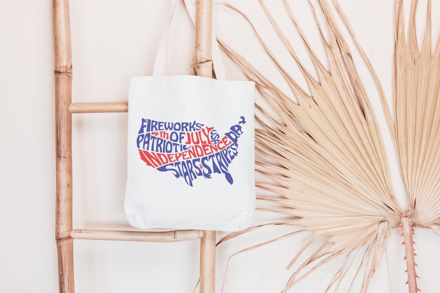This patriotic design features the words: Patriotic, Fireworks, Stars and Stripes, Independence Day and 4th of July, creatively arranged within the silhouette of the United States.
