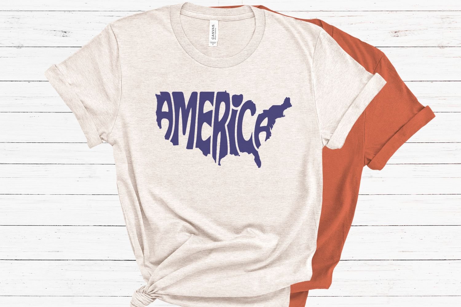 This patriotic design features the word America creatively arranged within the silhouette of the United States.